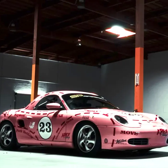 The #23 Boxster in the warehouse between orange columns. Opens the post on Instagram.