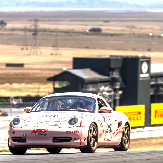 #23 cresting a rise at Sonoma Raceway. Opens the post on Instagram.